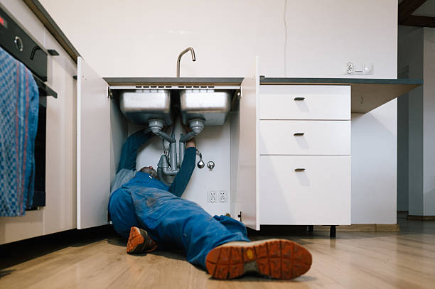 Professional Plumbing technician working in Russell, KY